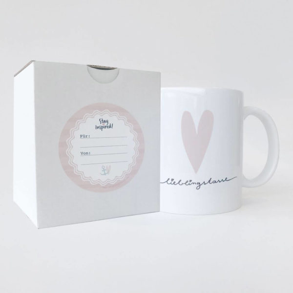 Keramiktasse mit rosa Herzdesign und Lieblingstasse, verpackt in passender Schachtel und rosa Geschenkaufkleber